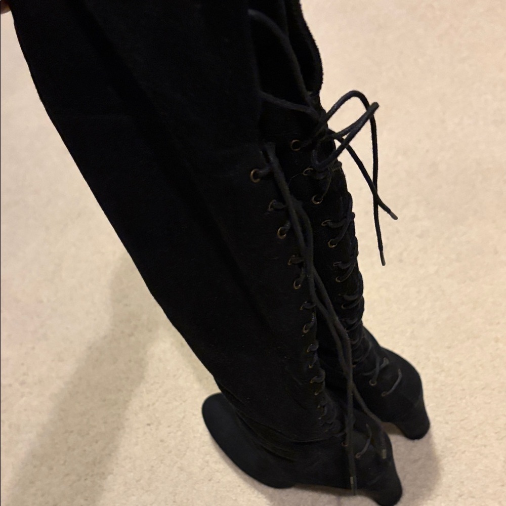 Stewart Weitsman Black Lace-Up Knee-High Boots with laces on the back